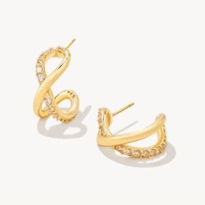 Kendra Scott Annie infinity Huggie Earrings. Gold with clear stones.